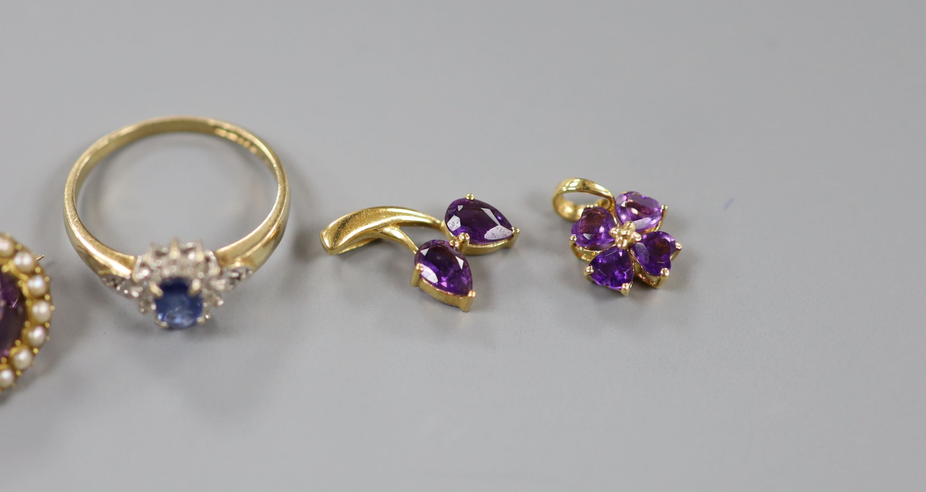 Mixed jewellery including five 9ct and gem set dress rings and a 9ct small pendant, gross 14.9 grams, an 18k and citrine ring and two 18k and amethyst set small pendants, gross 10 grams, a 15ct and amethyst brooch, gross